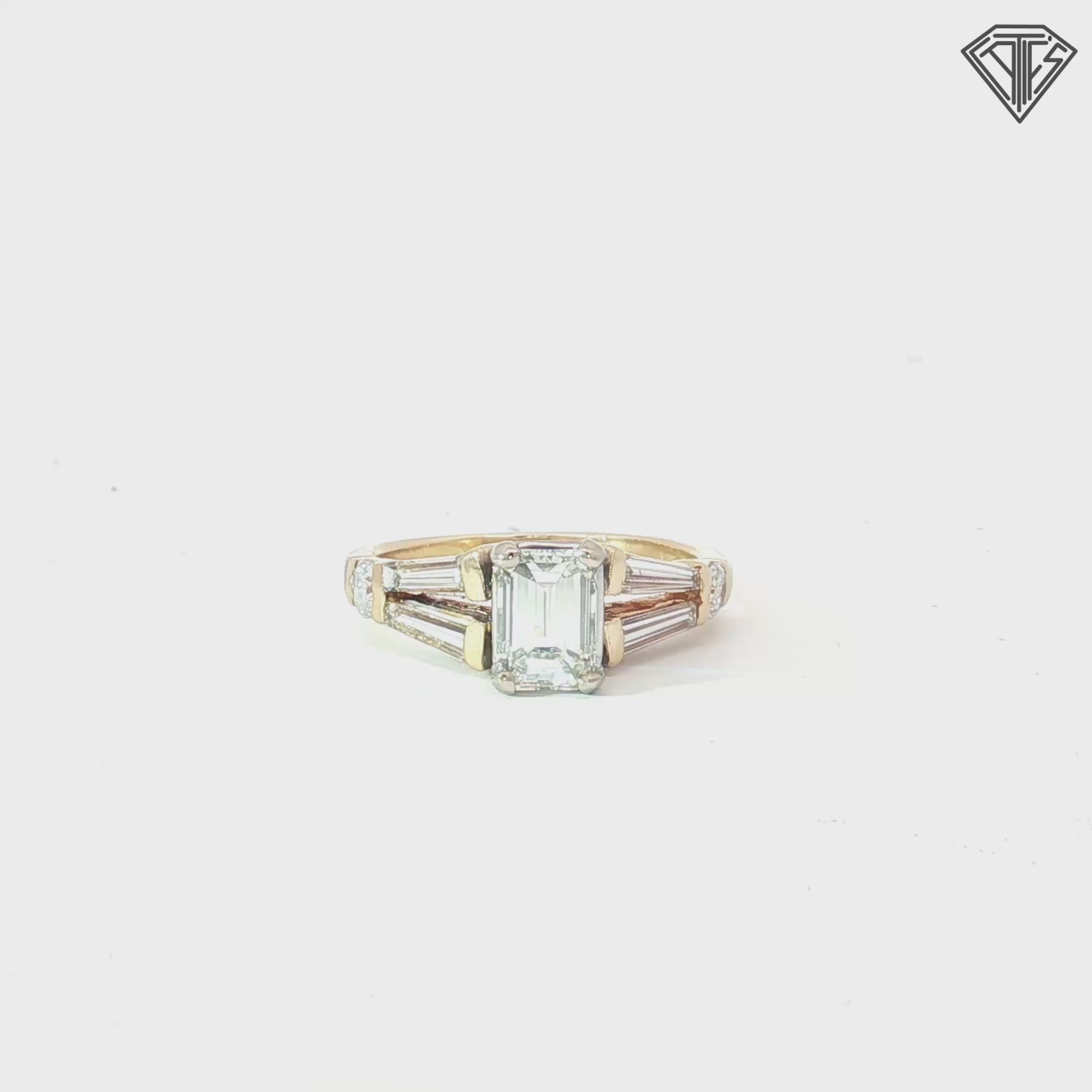 14k Two Tone 1.00ct I VS1 Emerald Cut Diamond/ (2)  .50ct E VS2 Tapered Baguette Shape  Diamond and (2) .25ct E VS2 Round Diamond  Engagement Ring Size 7 Certified By GIA #2223349315