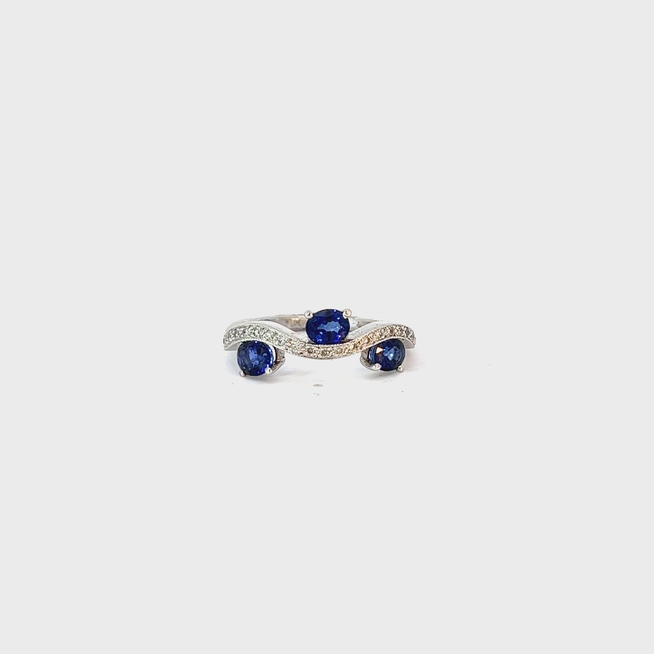 14k white gold 1.12ct Oval Blue Sapphire and surround by 1.13ct G SI1 Round Diamond ring