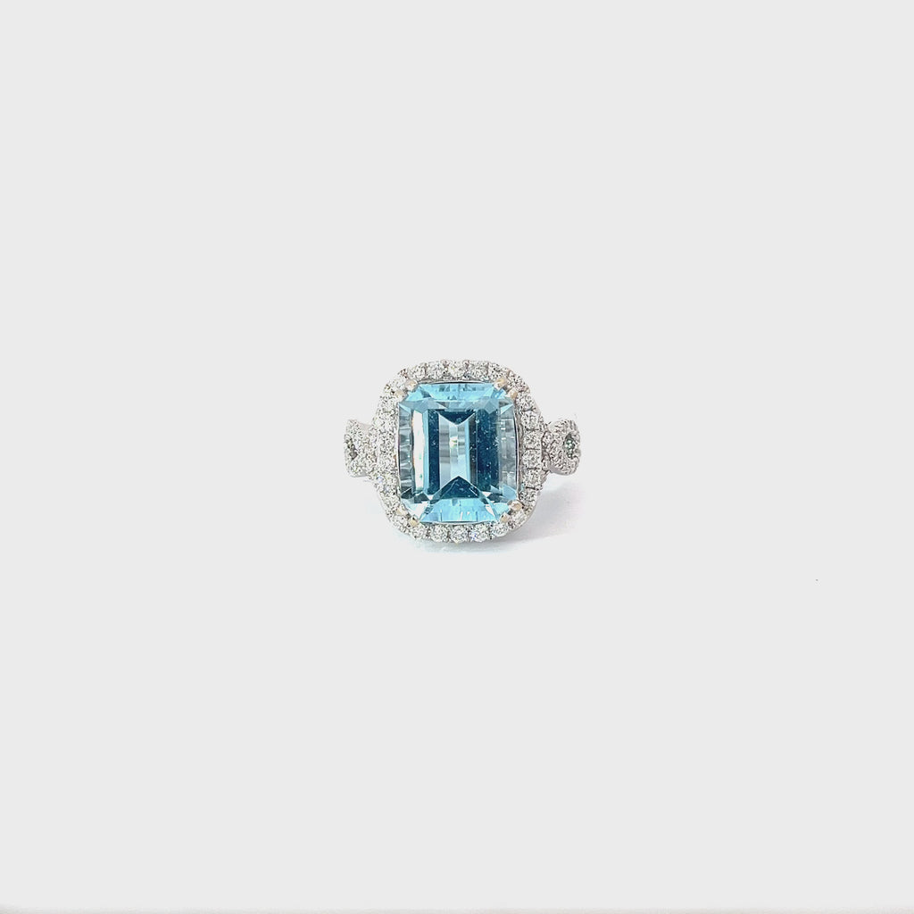 18K WHITE GOLD 7CT AQUA MARINE AND .75CT F SI1 ROUND DIAMOND RING
