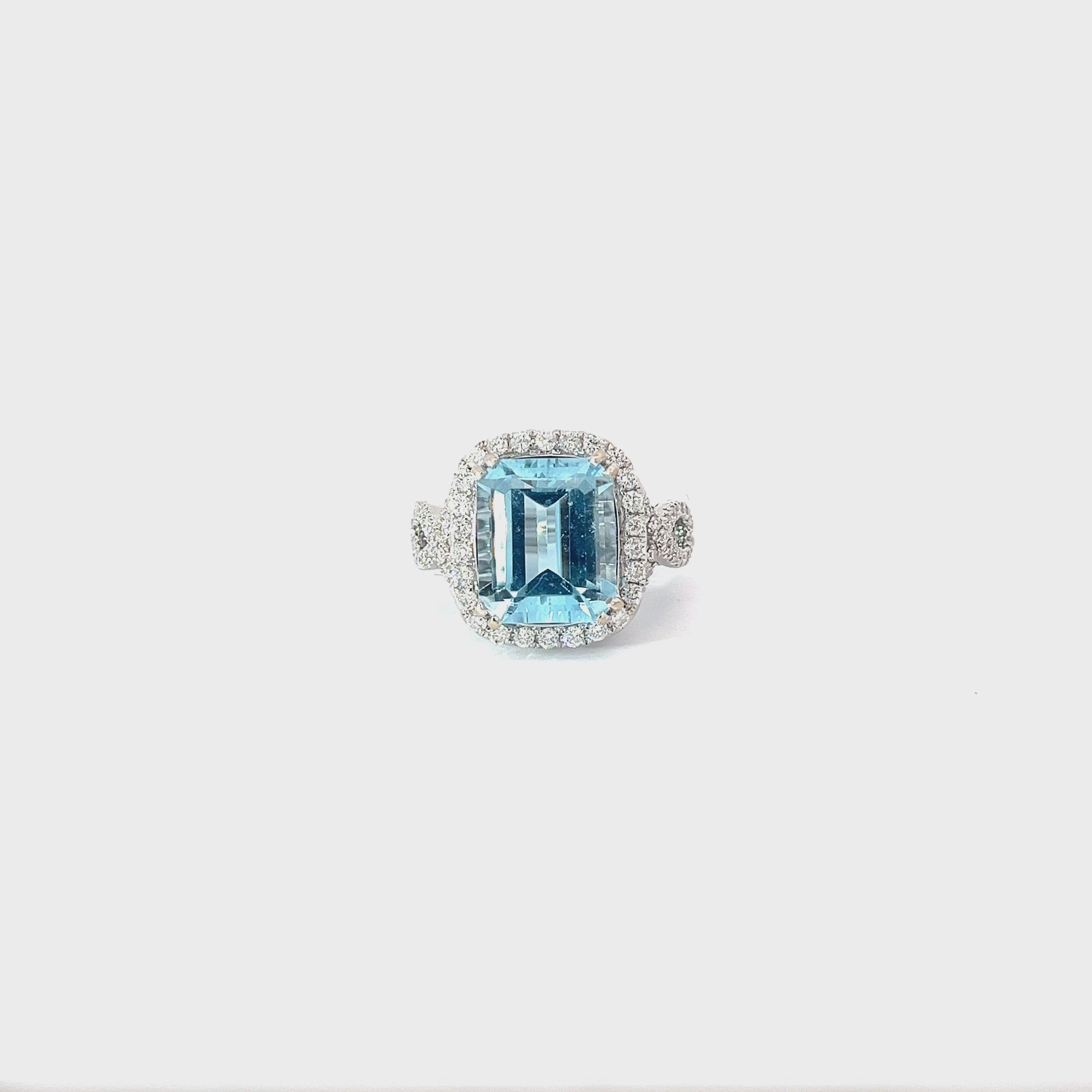 18K WHITE GOLD 7CT AQUA MARINE AND .75CT F SI1 ROUND DIAMOND RING