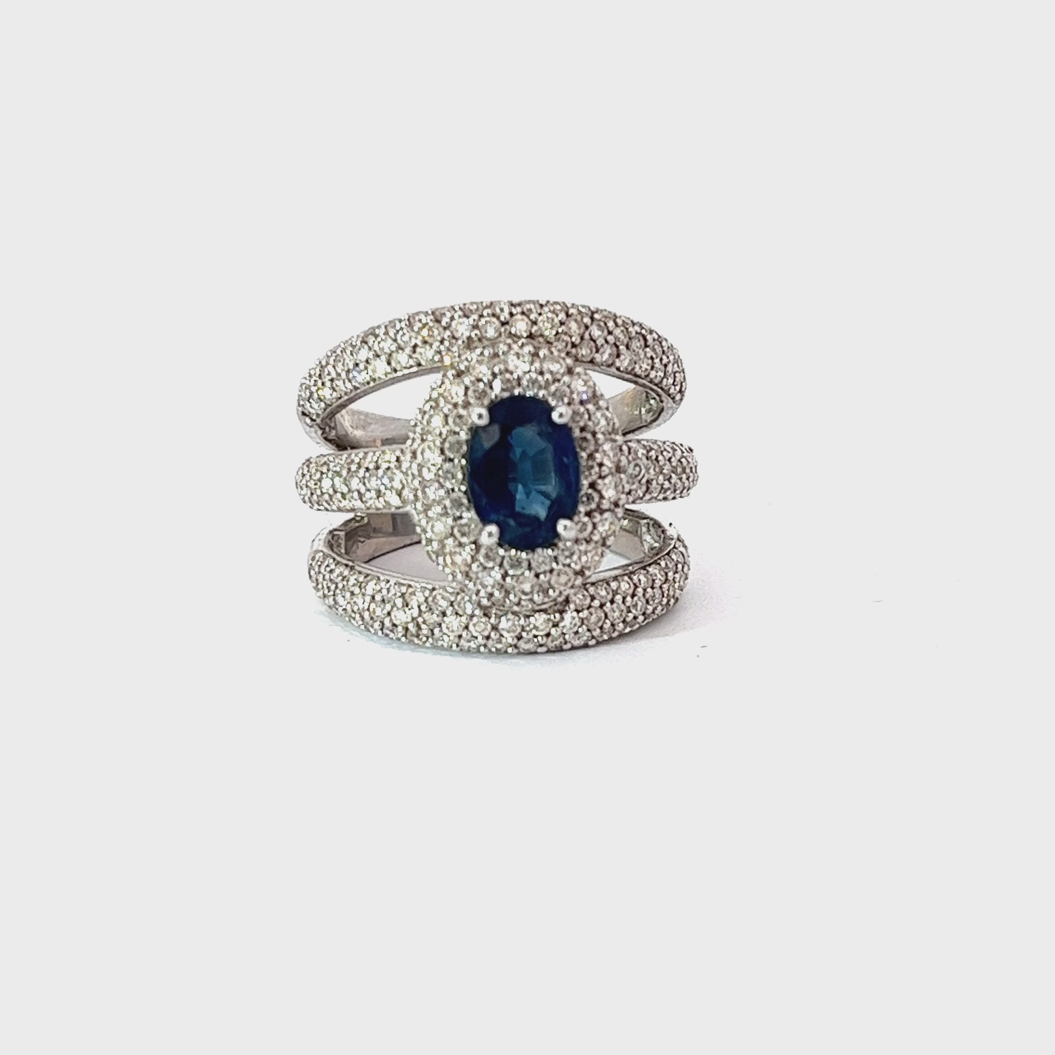18k White Gold 1.37ct Oval AA Blue Sapphire and surround by pave set 1.37ct G SI1 Round Diamond Ring