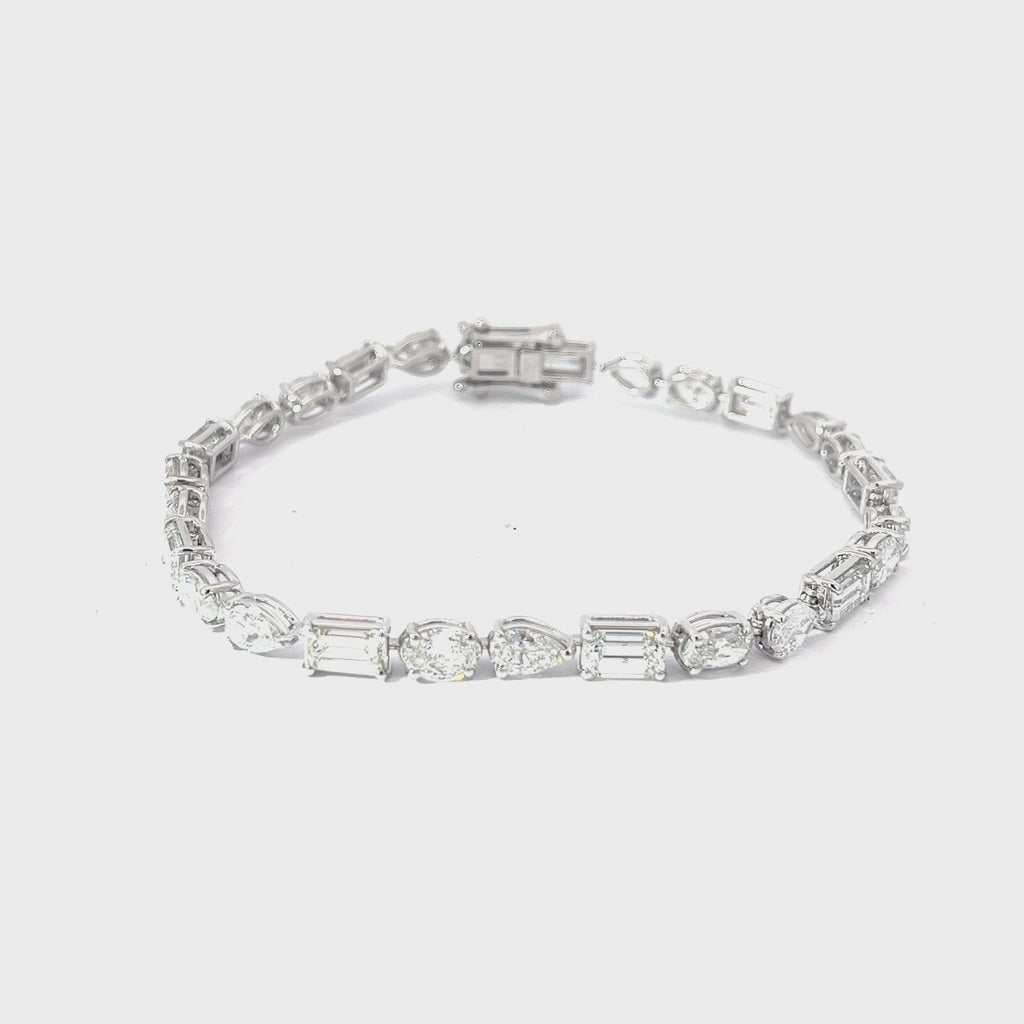 18K  WHITE GOLD 9.52CT FGVS2 MUILTI SHAPE EMERALD, OVAL, PEAR,  PRICESS CUT AND MARQUISE  7" BRACELET
