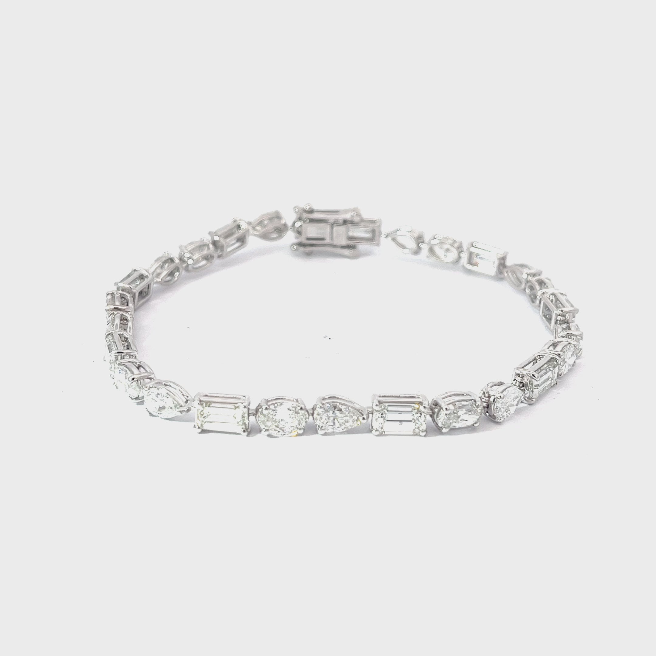 18K  WHITE GOLD 9.52CT FGVS2 MUILTI SHAPE EMERALD, OVAL, PEAR,  PRICESS CUT AND MARQUISE  7" BRACELET