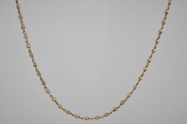 Ladies 14k Yellow Gold Diamonds by the yard necklace