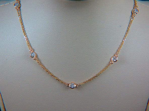 Ladies 14k Yellow Gold Diamonds by the yard necklace