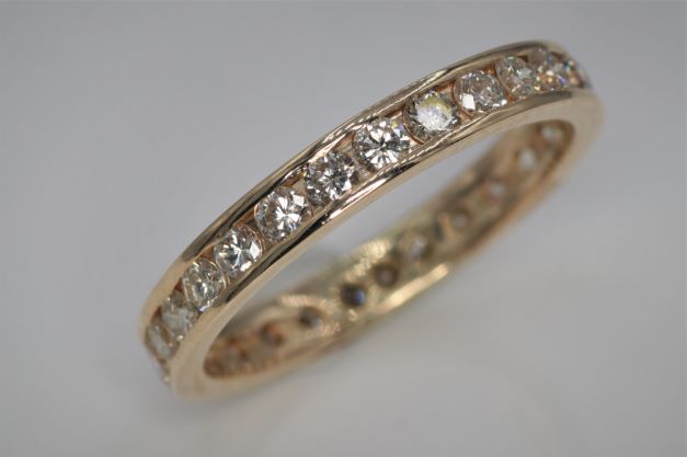 Ladies 14k yellow gold diamond band ring